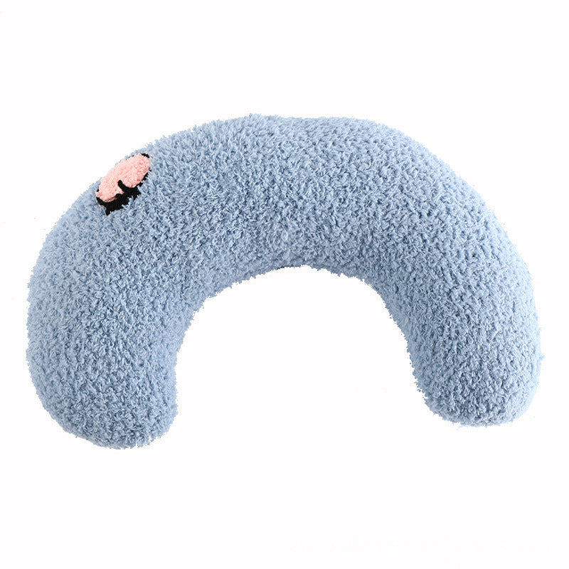 Pet headrest pillow cradling head and neck in comfort